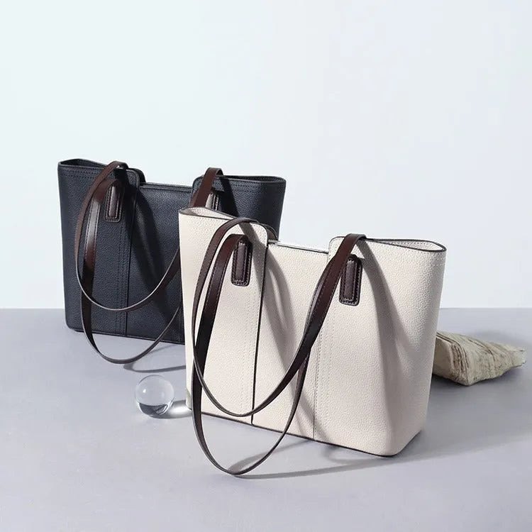 Genuine leather women's shoulder bag in box-type design with shoulder strap, shown in khaki colour