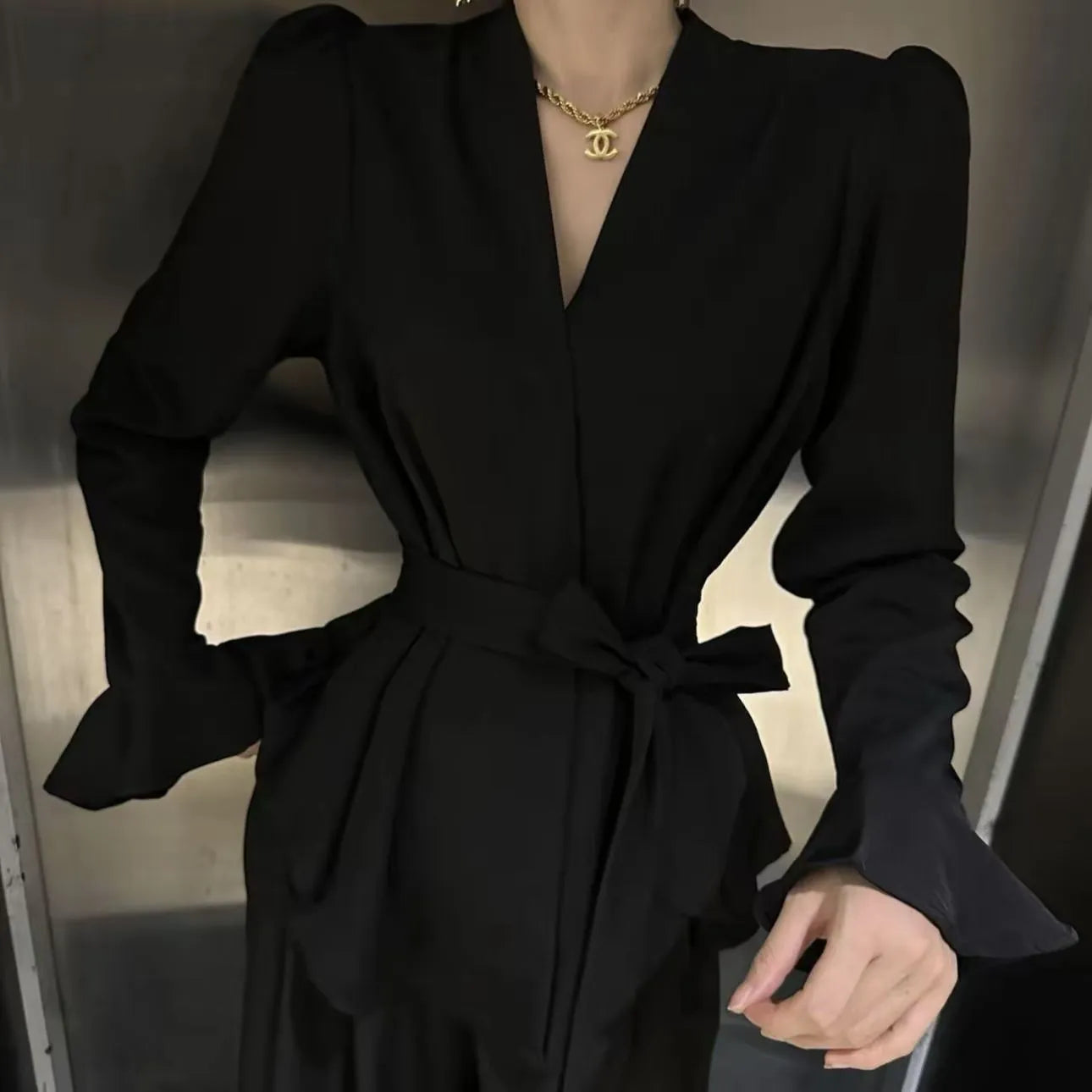 Women's French-style long sleeve shirt with irregular collar and bell sleeves in wine red.
