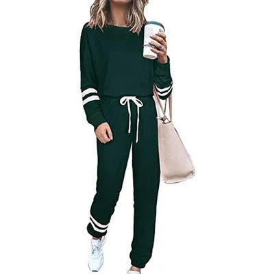 Women's plus size loose-fitting casual suit set in a solid colour with half-length sleeves.