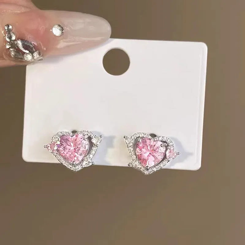 Guardian Heart stud earrings with white k gold electroplated finish on copper