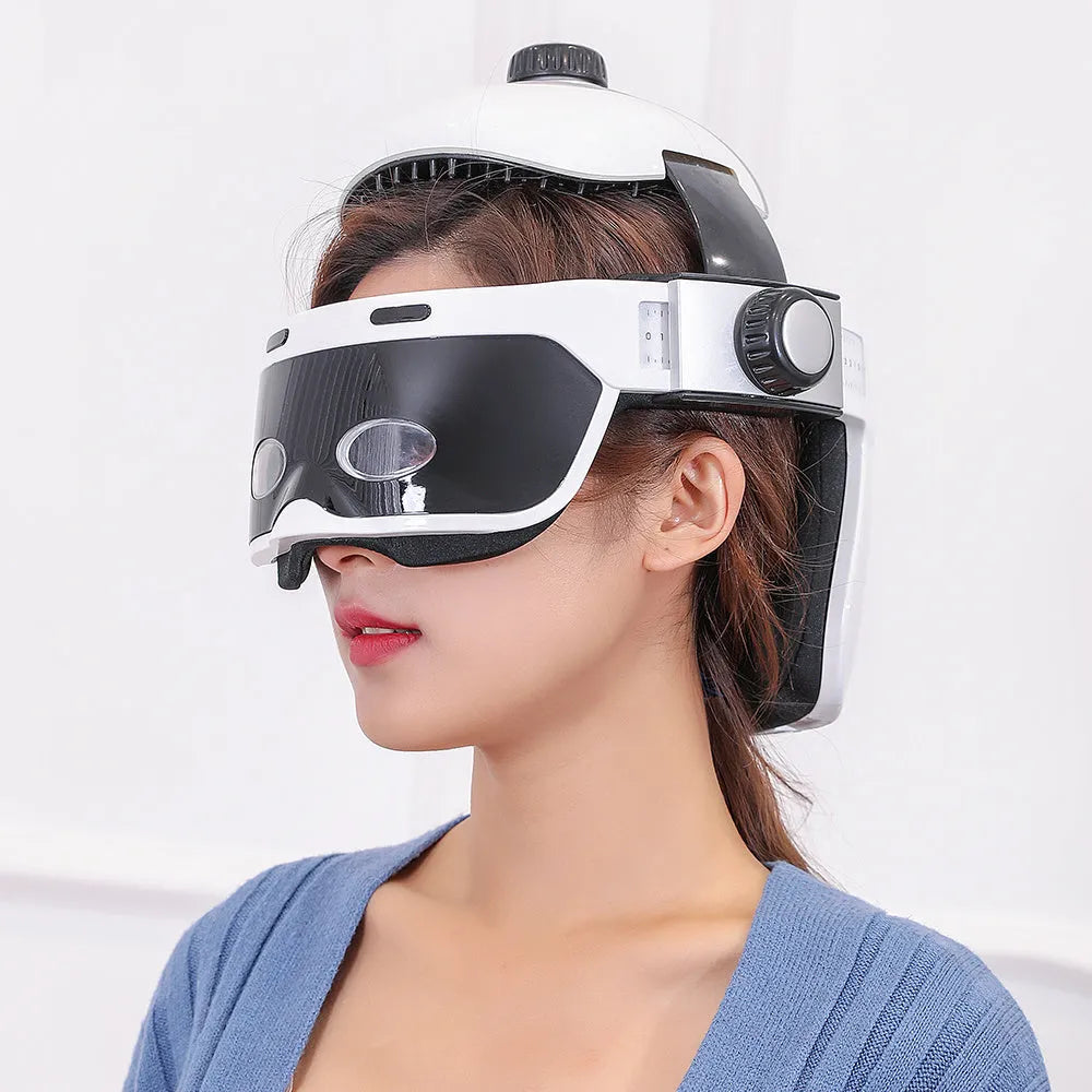 Electric eye massager in white and black with adjustable headband and LCD remote