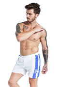 Men's blue lace-up sports shorts with built-in padding for running and table tennis activities