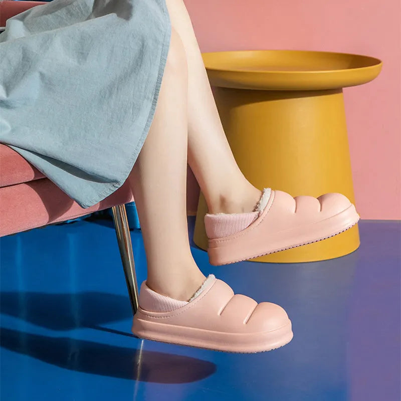 Waterproof EVA couple slippers in multiple colours with a non-slip sole and plush lining for winter.