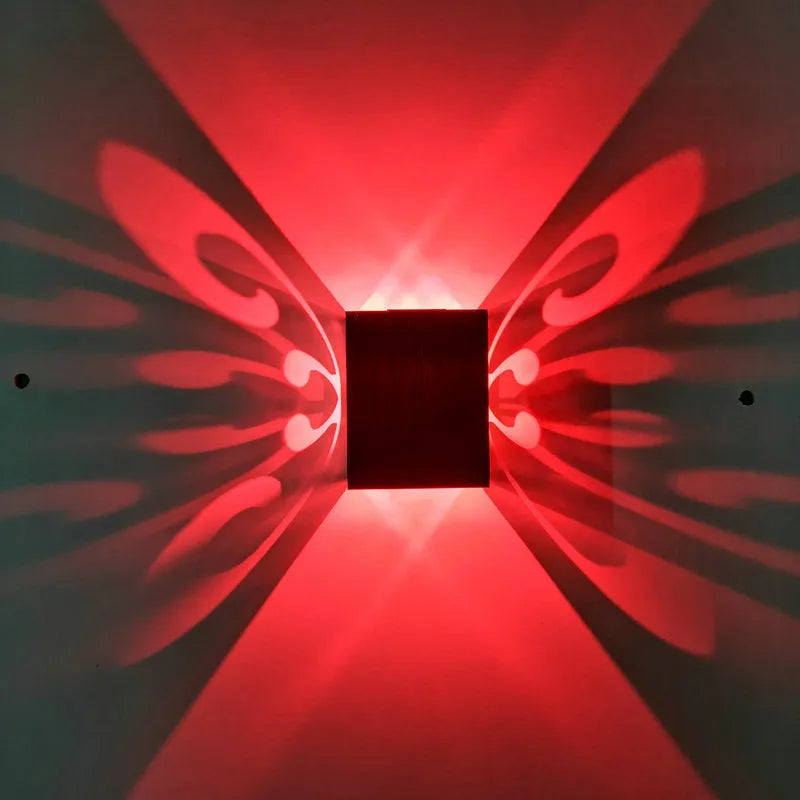 Butterfly-shaped LED wall lamp with aluminium shade and remote control for colour selection