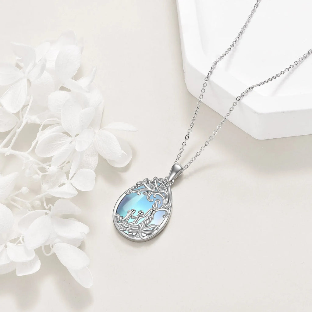 Sterling silver moonstone tree of life pendant with white gold plating on 18-inch cable chain