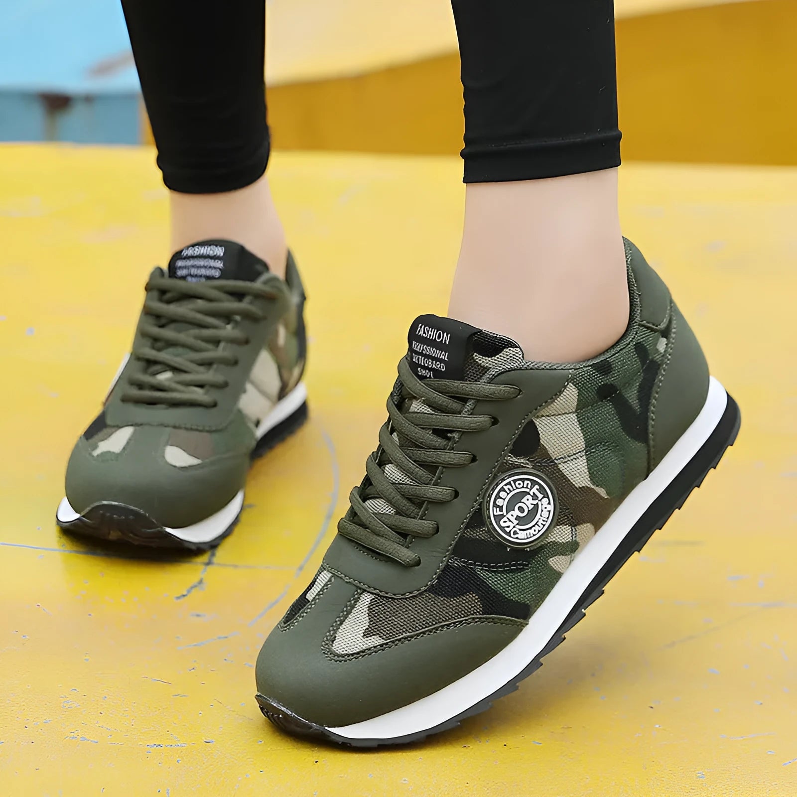 Camouflage pattern suede low-top running shoes with mesh lining on a flat foam sole.