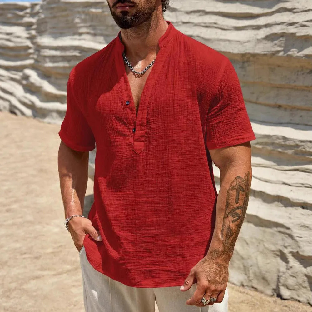 Men's solid colour stand collar short-sleeved shirt laid flat.