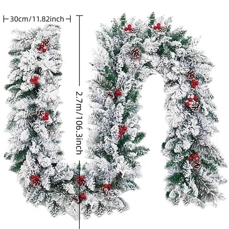 White flocked snow artificial Christmas rattan vine garland draped for decoration.