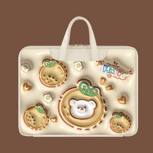 Inflatable PU leather laptop bag in a character design, shown hanging from a suitcase handle.