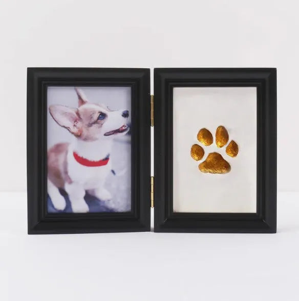 Solid wood cat palm print photo frame with gold lacquer and seal paste kit on table