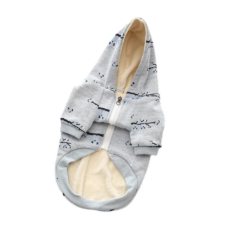 Blue cotton dog sweater with front zipper closure shown on small dog