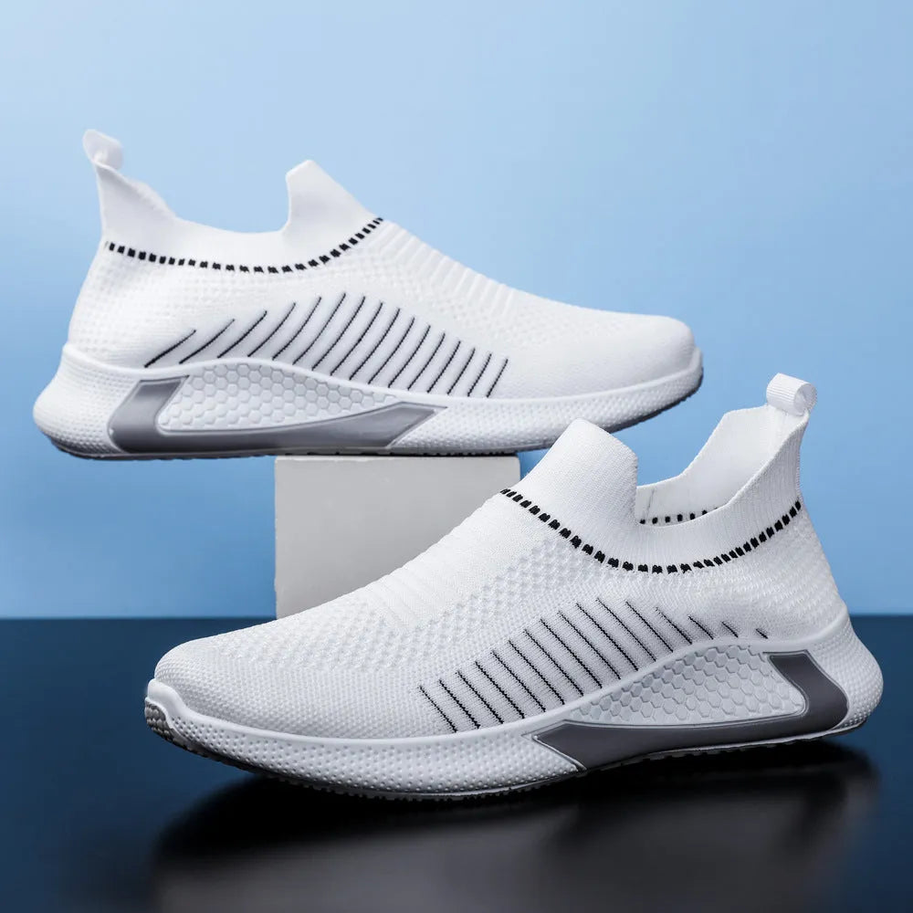 Men's black and white striped mesh sock shoes with lace-up front on a white background