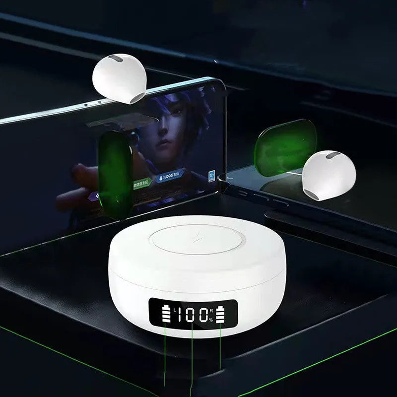 Mini black and white semi-in-ear wireless headphones sitting in their open wireless charging case.