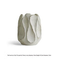 Irregular art ceramic vase in magnesium clay material displayed in high and low style options
