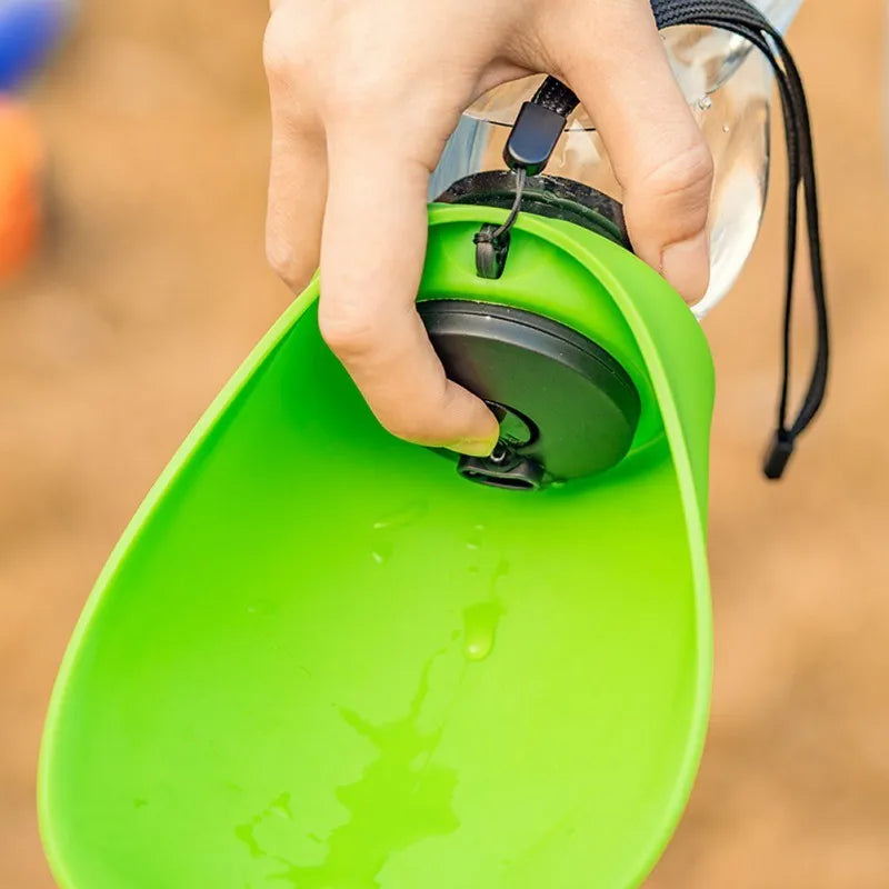 Portable pet dog water bottle with 680ml capacity, wide sink bowl, and leak-proof lock in fruit green colour
