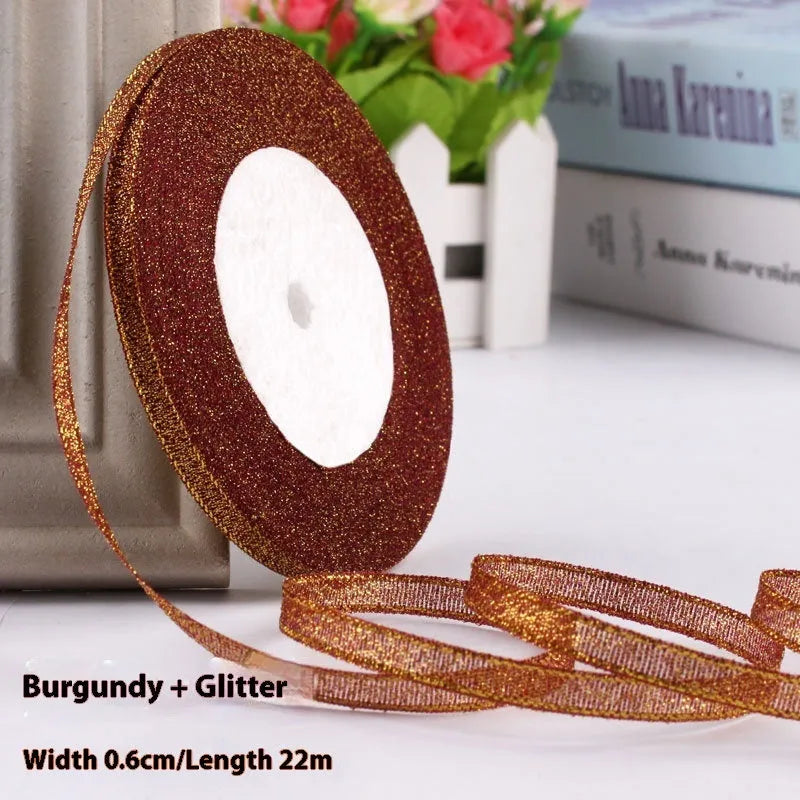 Roll of narrow 0.6cm wide polyester decorative ribbon in multiple colour options including metallic finishes
