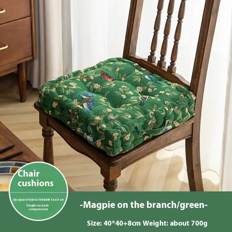 American style dining chair cushion in floral apricot pattern with bird motifs measuring 40x40x8cm