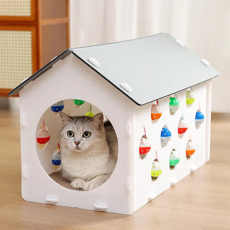 Integrated plastic cat scratch board with attached nest, tunnel, and a bell ball toy.