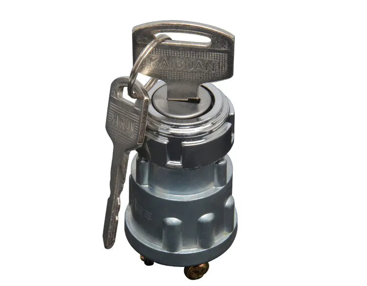 Pure copper vehicle ignition switch lock with matching key on a white background.