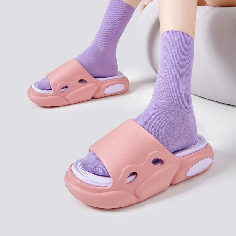 Two-tone thick-soled EVA slippers for men and women in pink purple, white green, or black and white.