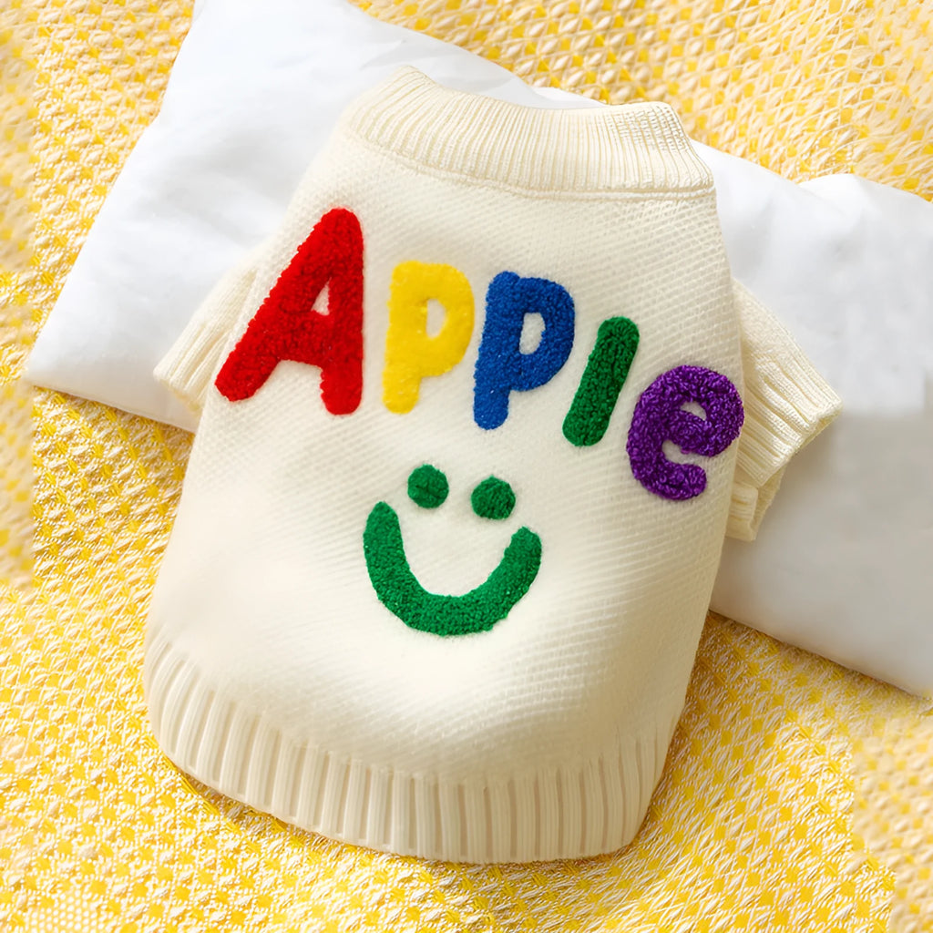 Knitted small dog sweater in white with multicolour Apple and smiley face embroidery