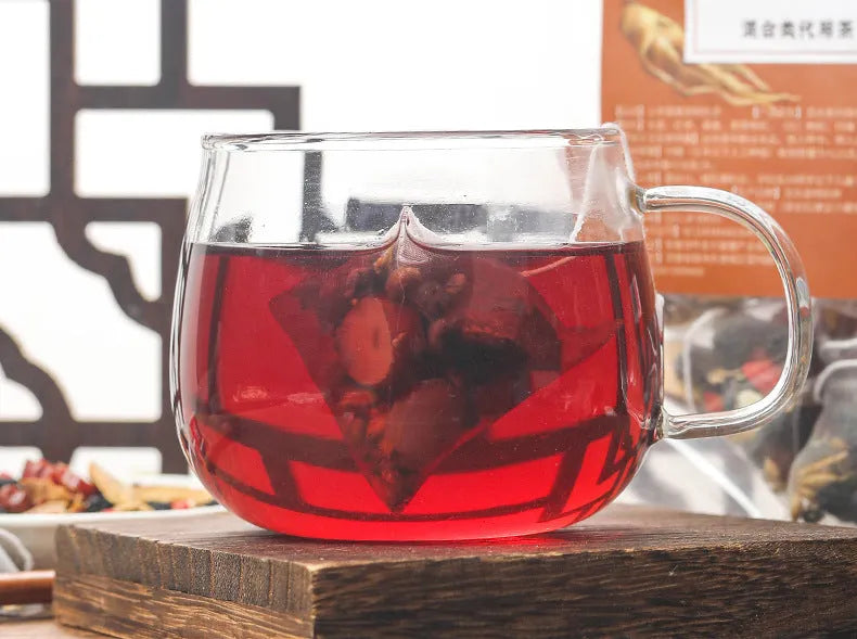 A bag of ginseng and black wolfberry tea containing 40 individual 5g sachets.