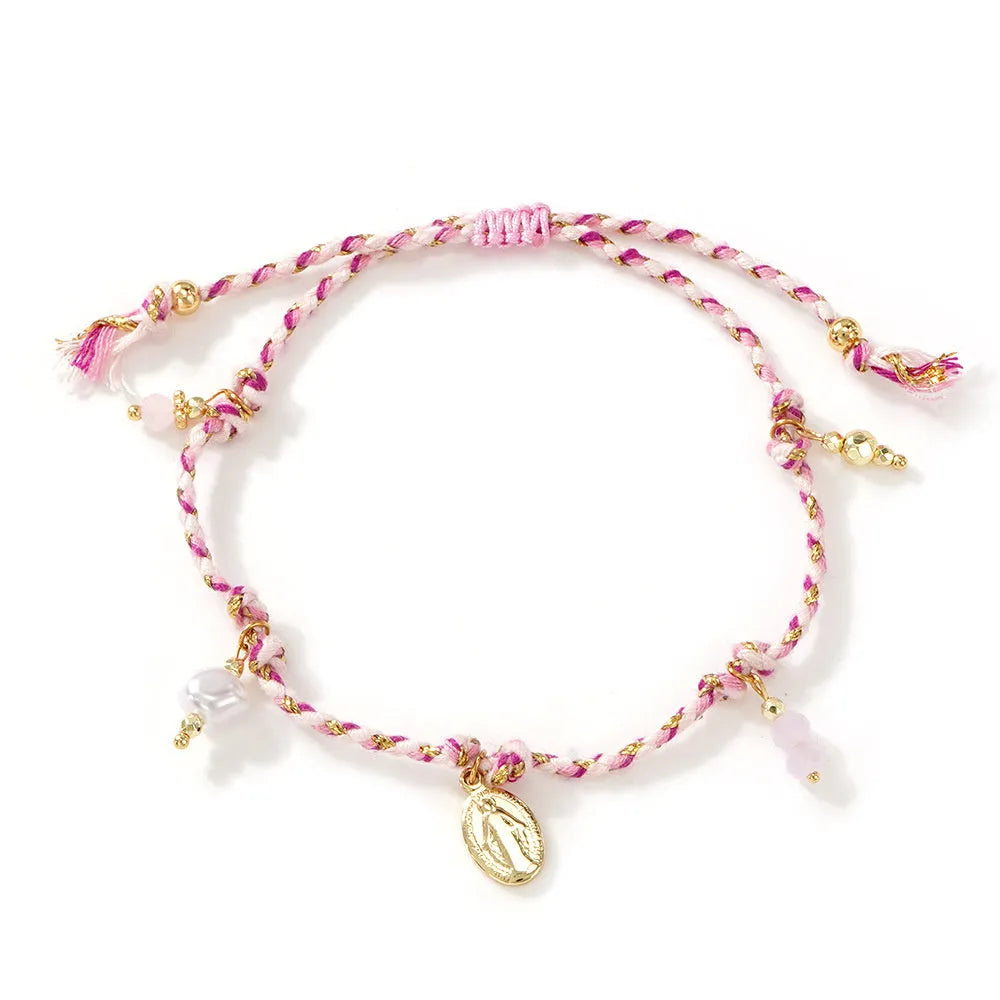 Ethnic style women's bracelet handmade from colourful braided rope with woven carrying strap tag design