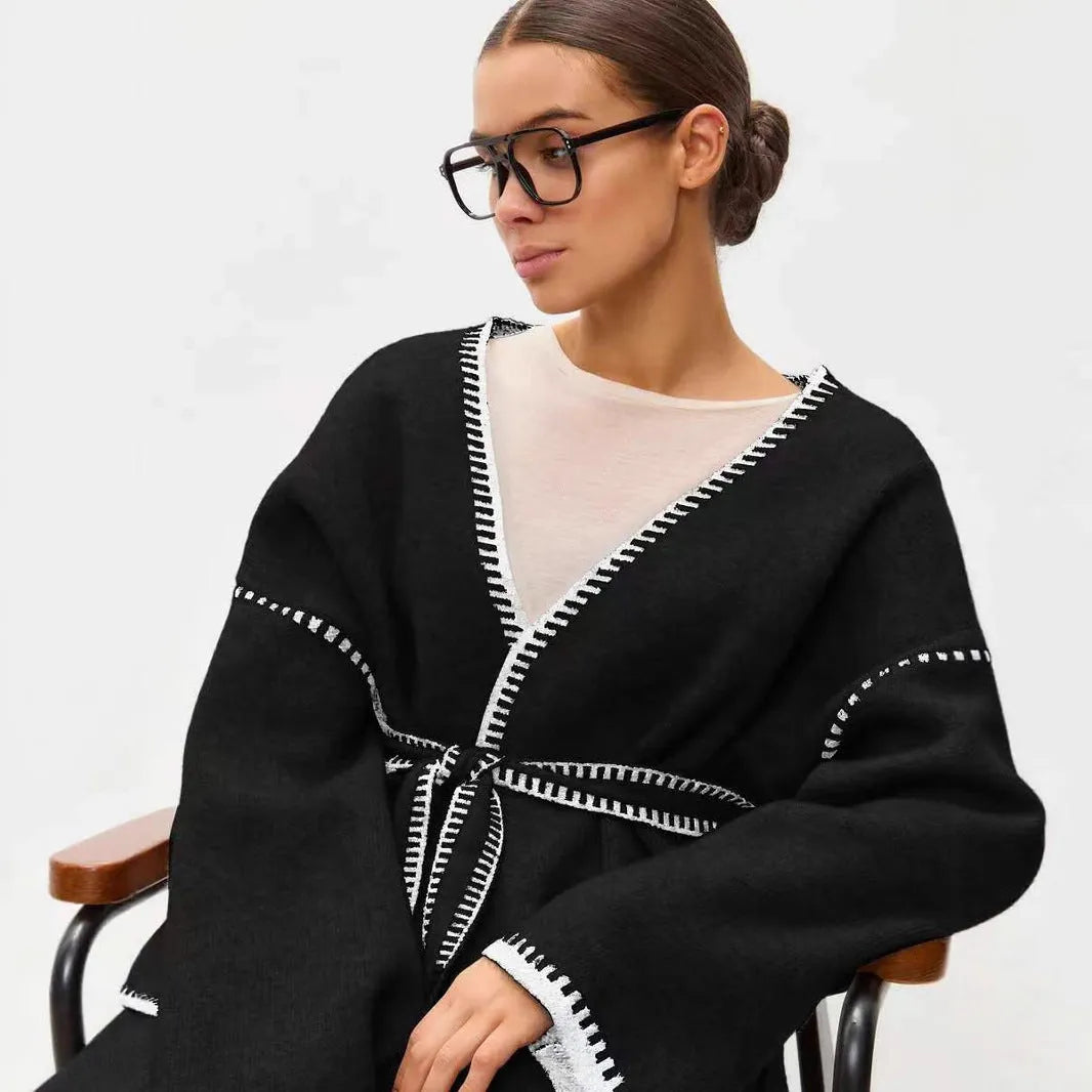 Lace-up front knitted cardigan in black camel or white colours with loose fit and long sleeves