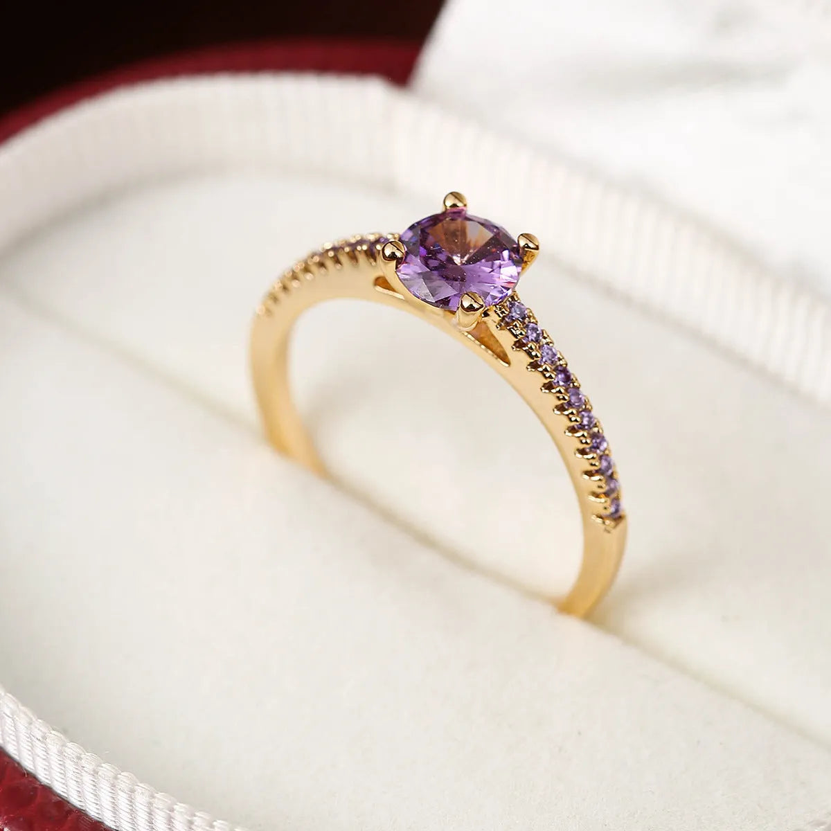 Hexagonal geometric zircon ring in copper with electroplated finish showing angular design and zircon stone