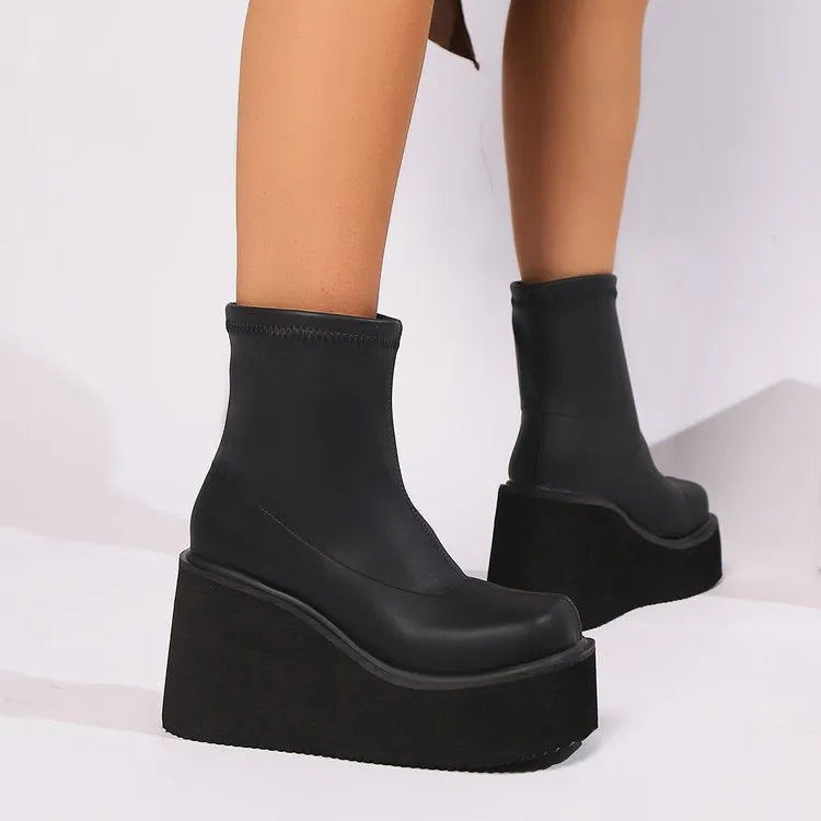Plus size women's black wedge heel ankle boots with round toe and waterproof platform