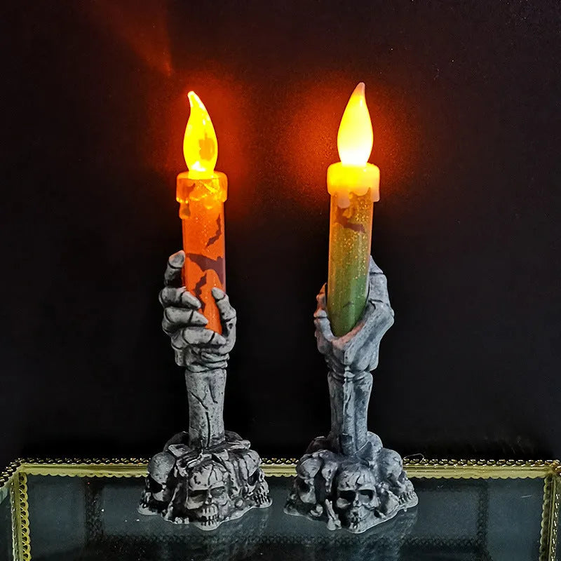 Plastic skeleton ghost holding a candle light Halloween decoration in orange and green