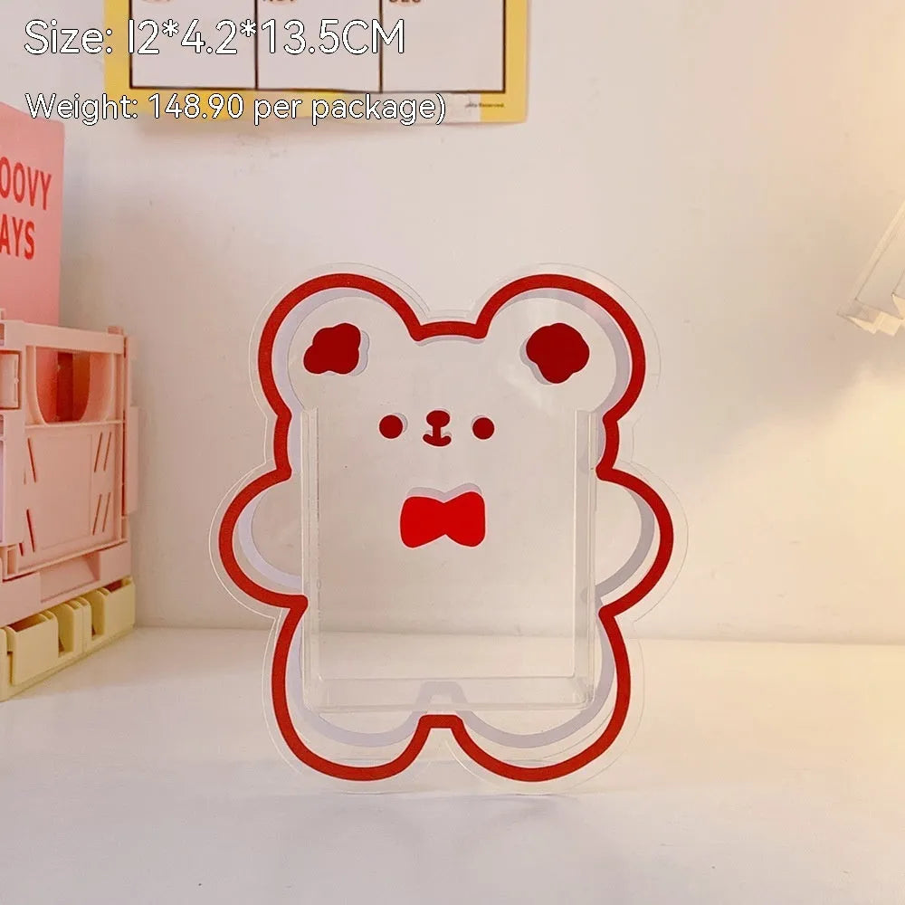 Clear square acrylic stationery storage box with lid in cute character design on desktop