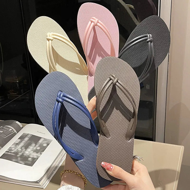 Men's PVC flip flops with toe cover design in multiple colour options showing injection moulded construction