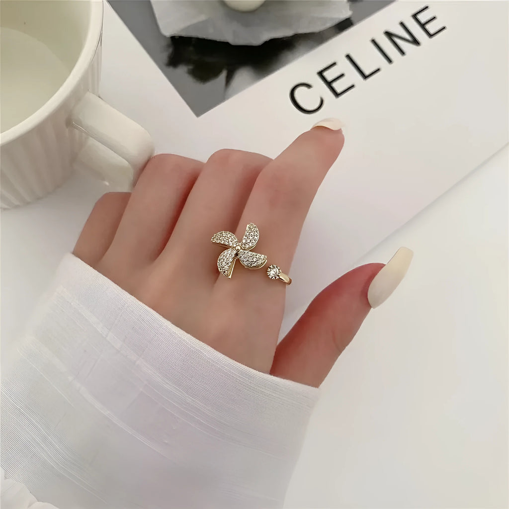 Micro inlaid rotating ring in copper with gold or silver electroplated finish