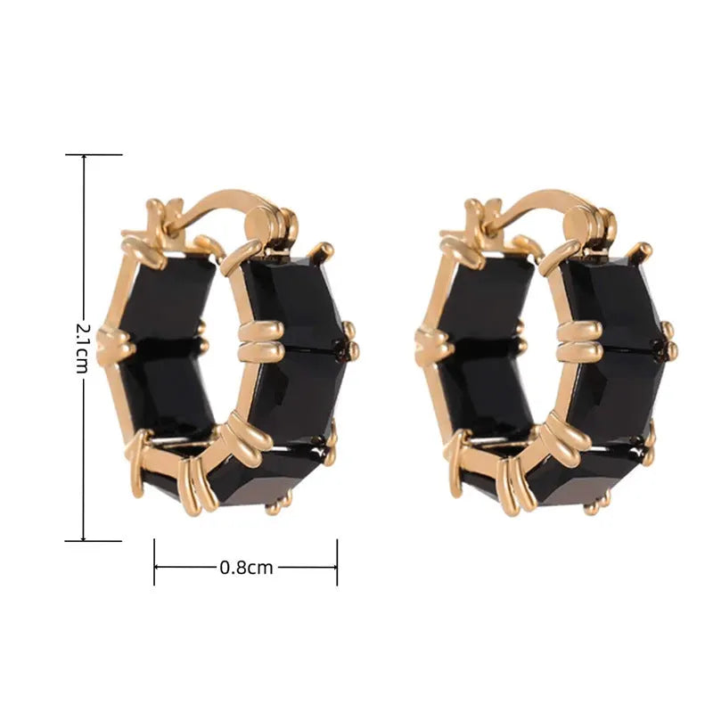 Gold electroplated copper earrings with geometric U-shape design and zircon crystals