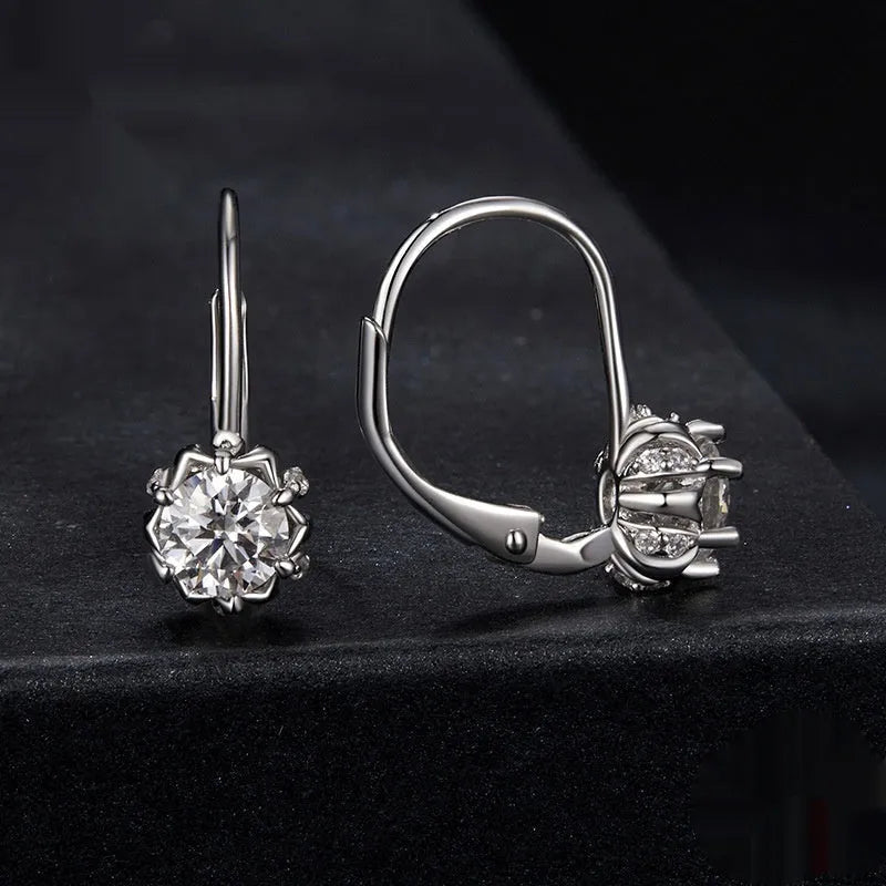 Sterling silver flower bud ear clips with moissanite centre stones and white gold plating