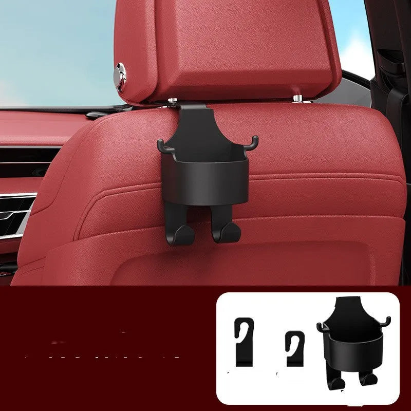 Black plastic car seat back organiser with cup holder and storage hook for vehicle interior