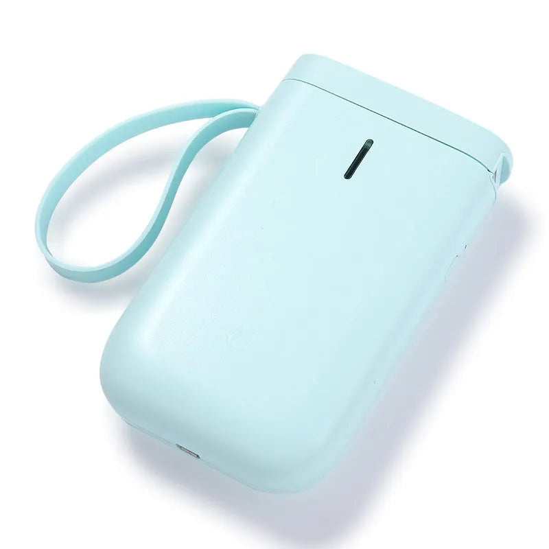 Compact D11 Bluetooth thermal label printer in black, white, pink, or green with smartphone showing label design app.