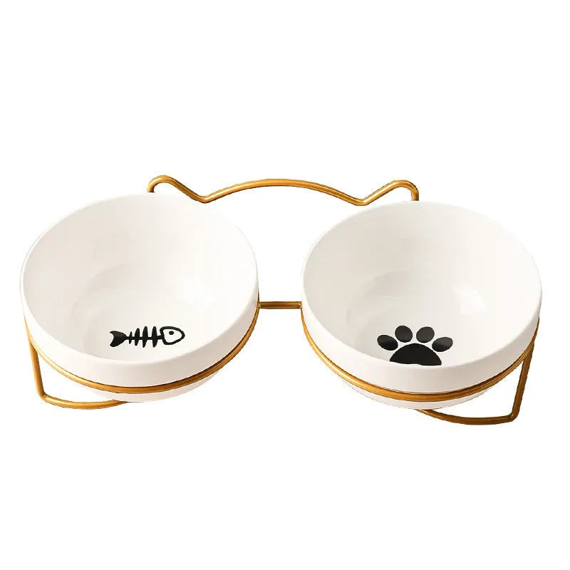 White ceramic cat bowl with decorative pattern and black iron frame support