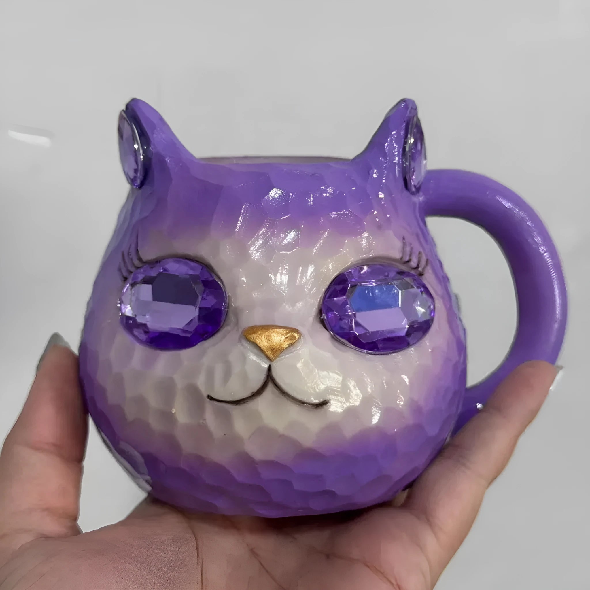 Crystal Earth decorative cat resin cup in American style, available in blue, green, pink, and purple colours.