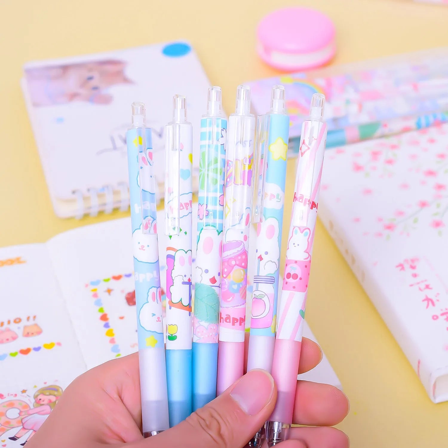 Six cartoon bunny design black ballpoint pens with 0.5mm tips in plastic packaging