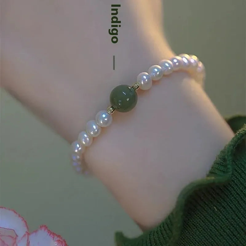 Chinese style bamboo leaf glass bracelet for women with a bamboo joint design.