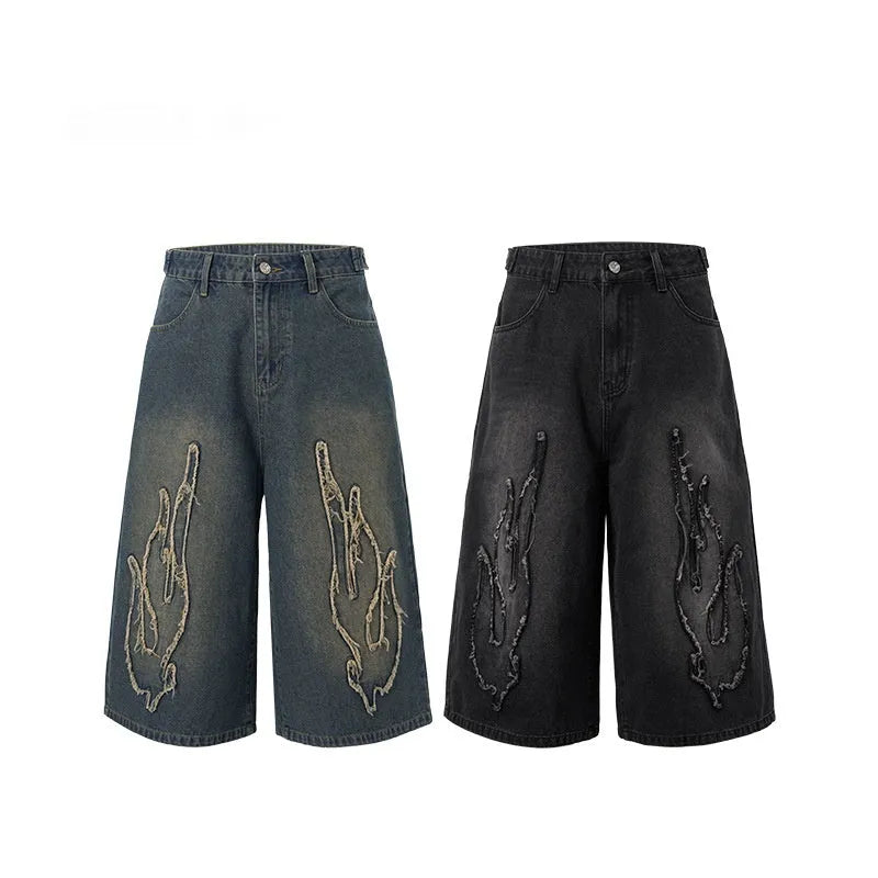 Men's black denim shorts with flame embroidery patches on leg, straight cut streetwear style