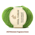 Roll of domestic wool knitting yarn for 10 needles in various colours including green, red, and blue