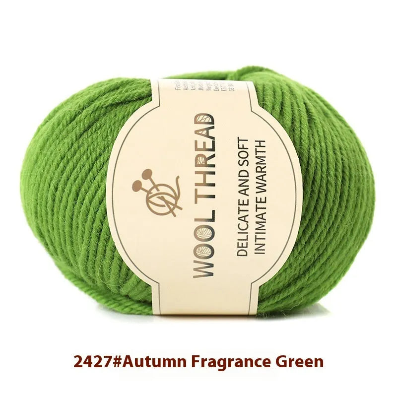 Roll of domestic wool knitting yarn for 10 needles in various colours including green, red, and blue