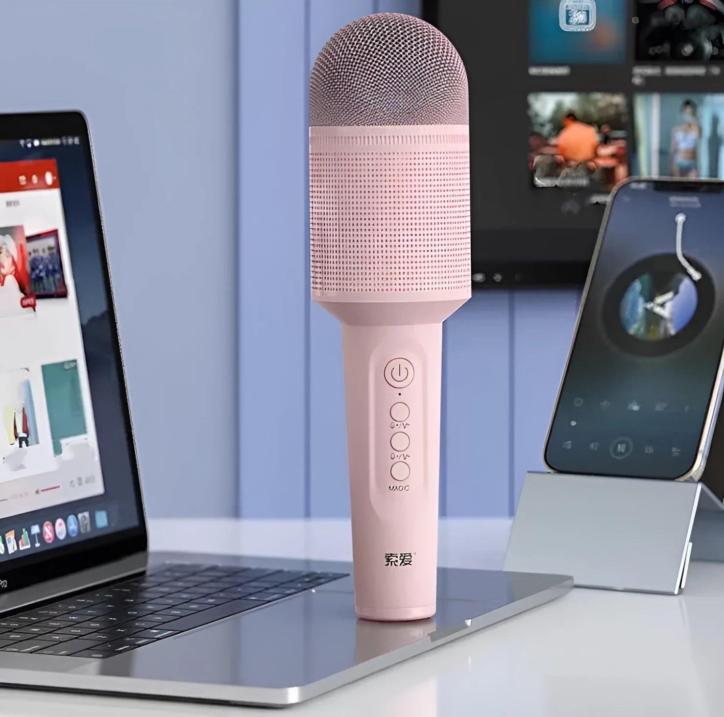 Bluetooth karaoke microphone with integrated speaker in pink, blue, or green colour.