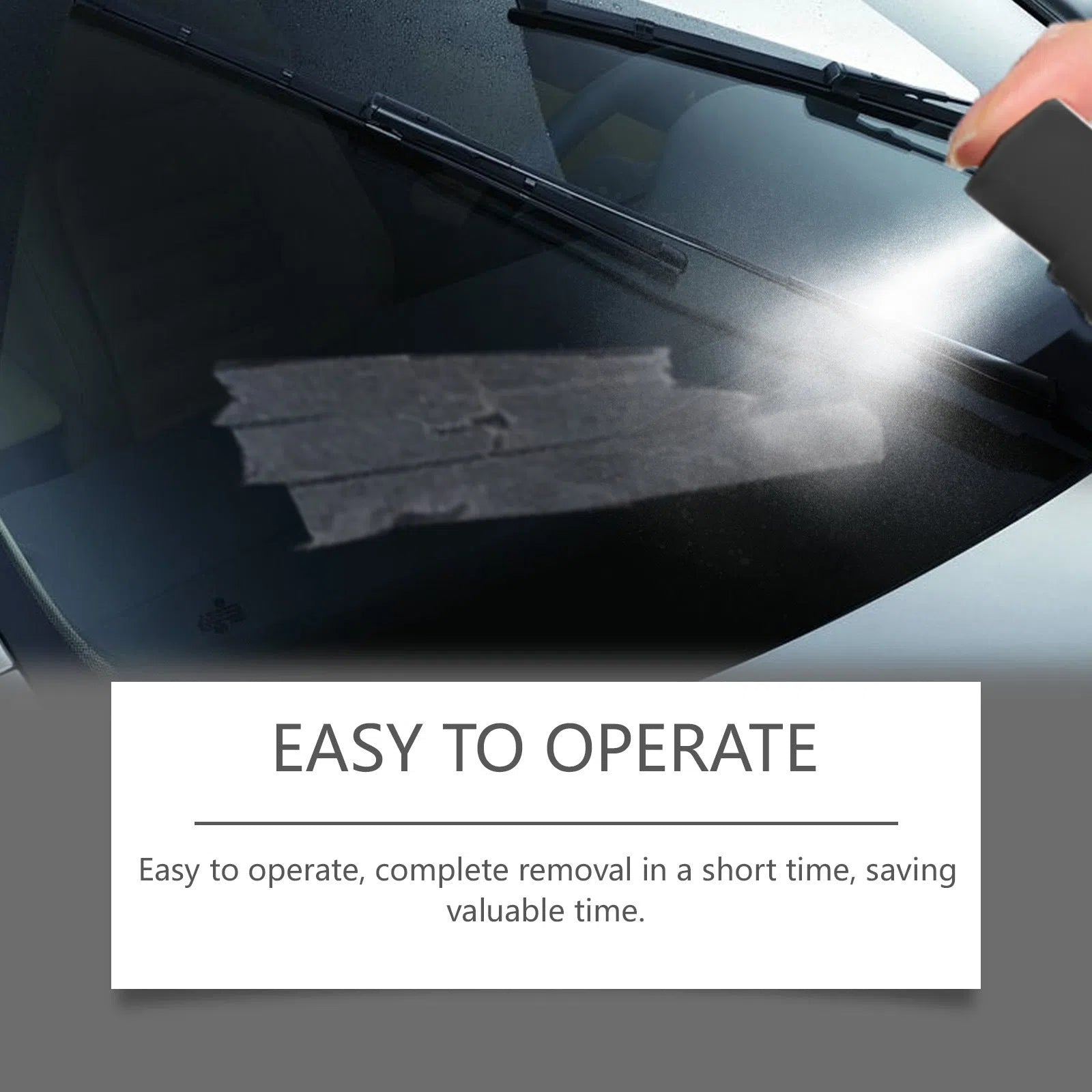Automobile sticker remover set with 100ml bottle and square towel on car windscreen