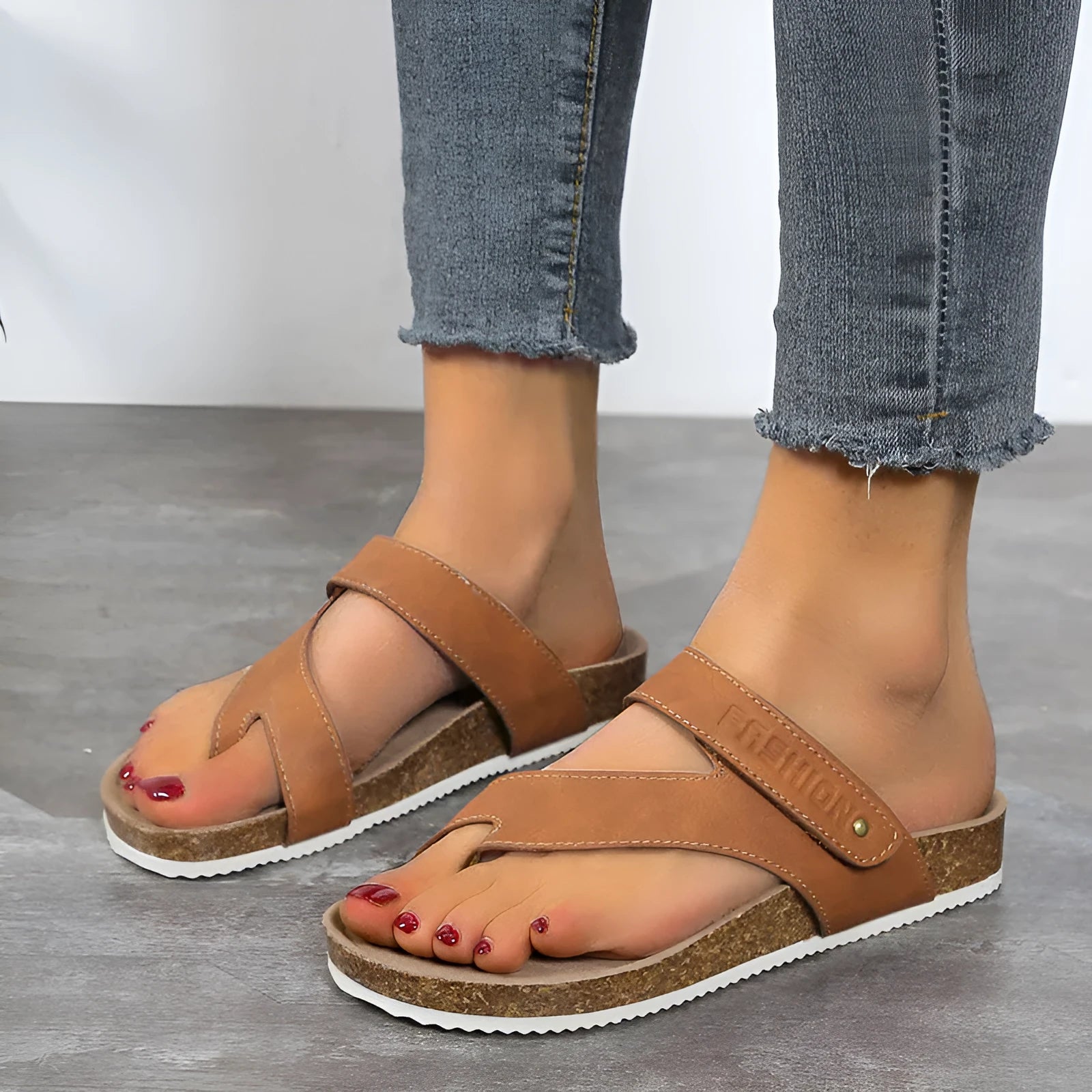 Flat toe ring flip-flops with a thick foam sole in a choice of solid colours on a white background.