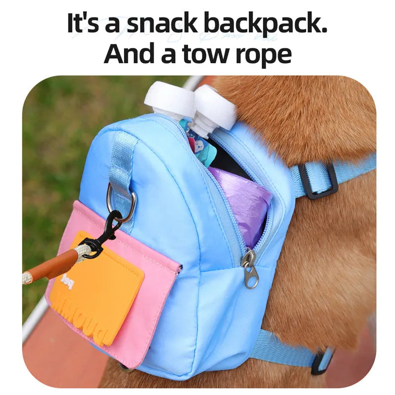 Blue adjustable dog harness with integrated backpack and attached tow rope on a medium-sized dog
