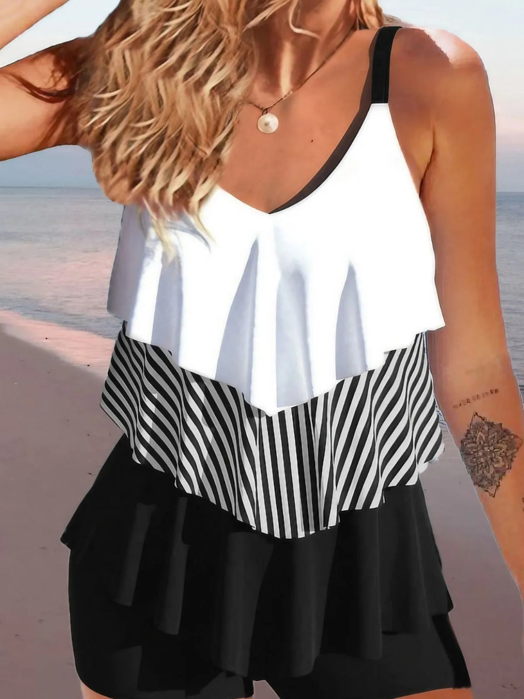 Women's sleeveless backless ruffle bikini swimsuit with spaghetti straps in solid colour, floral, or gradient pattern